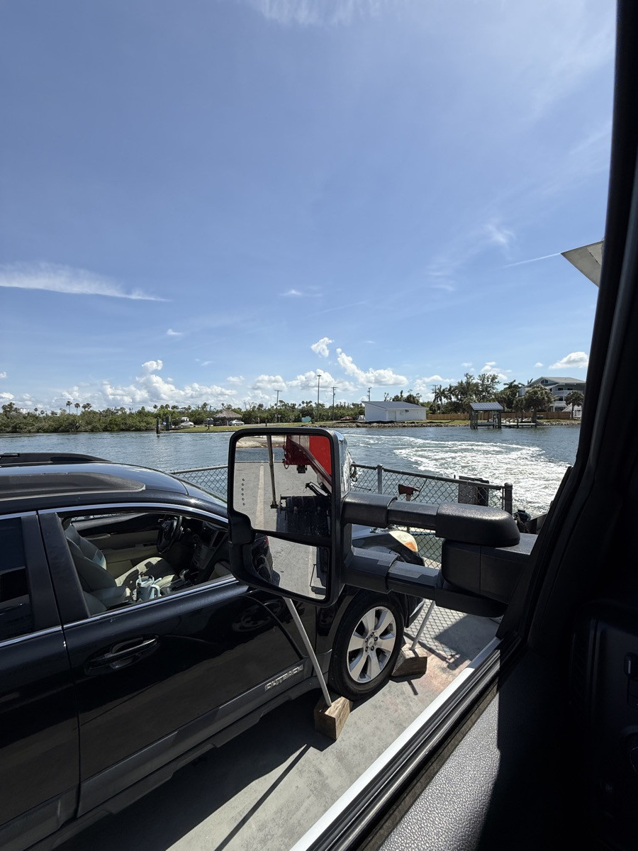 The Dumpster Fire truck crossing the water to the barrier islands near Placida, FL