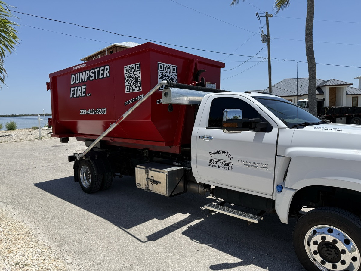 A Dumpster Fire roll-off dumpster on the water in Charlotte County, FL